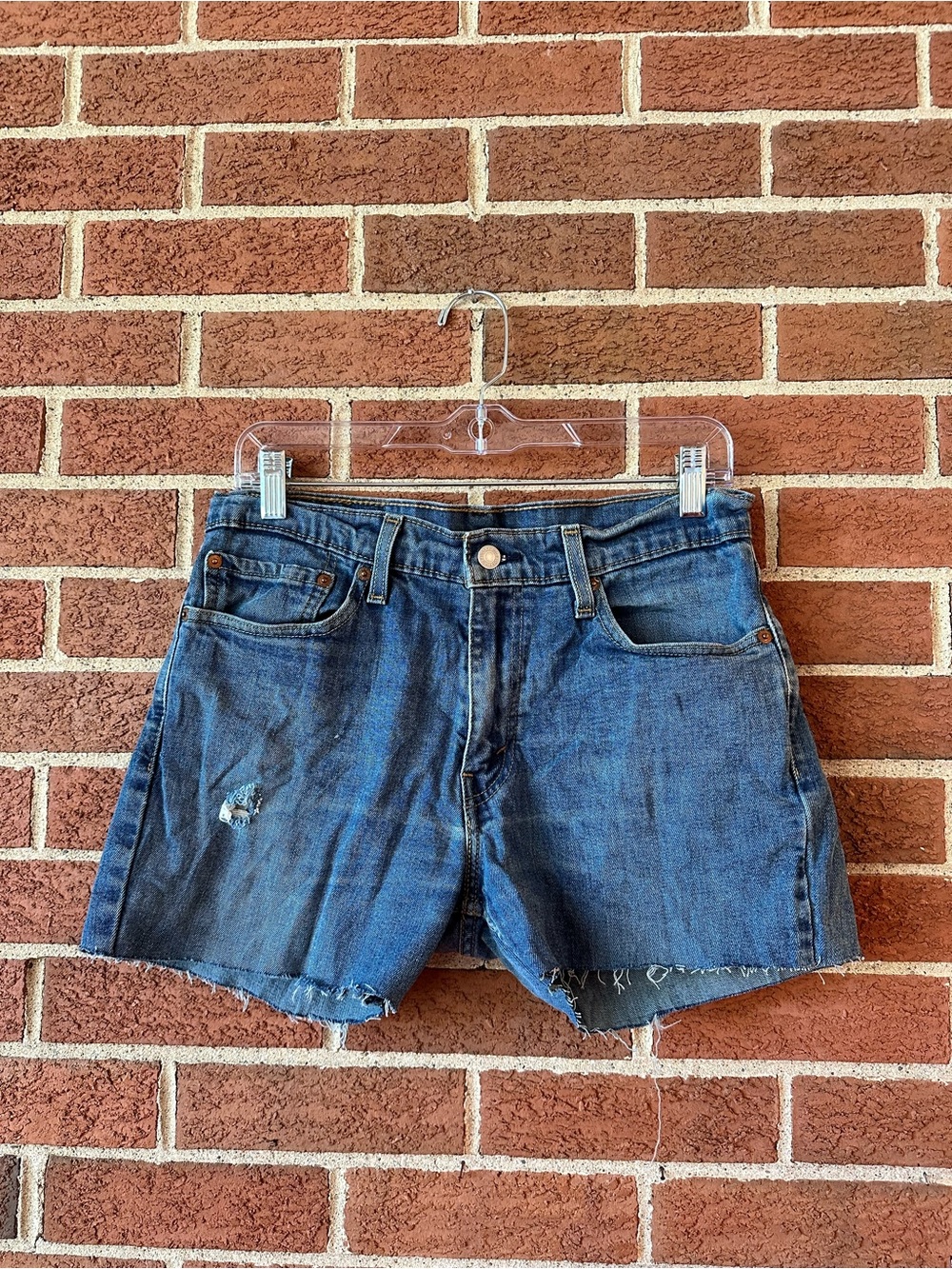 Levi's Distressed Denim Cutoff Shorts Medium Wash Raw Hem, Size 4 Waist 30